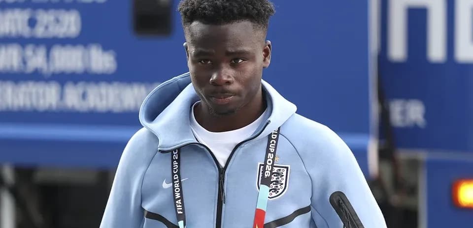 Player wearing England training gear arriving at venue