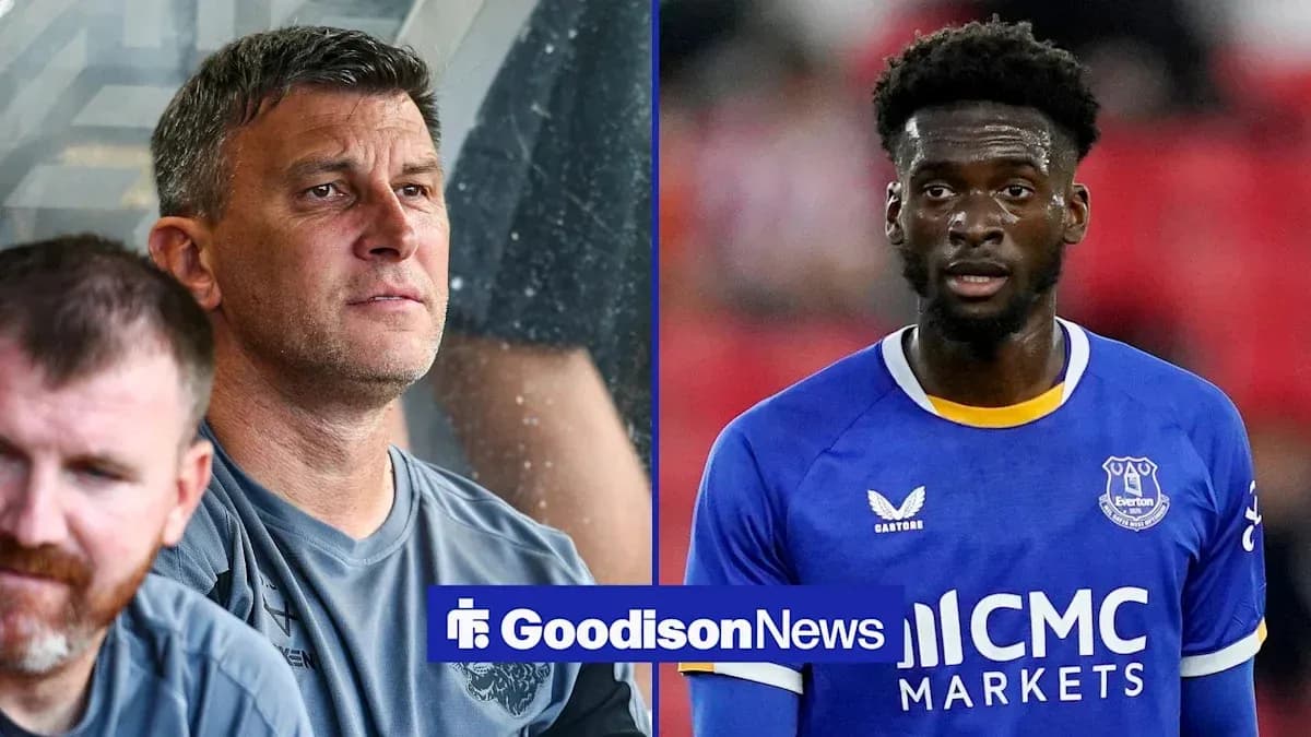 Manager and player during match coverage for Everton