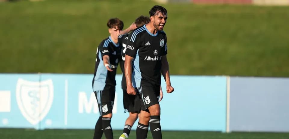 Players celebrating during Sporting KC II match