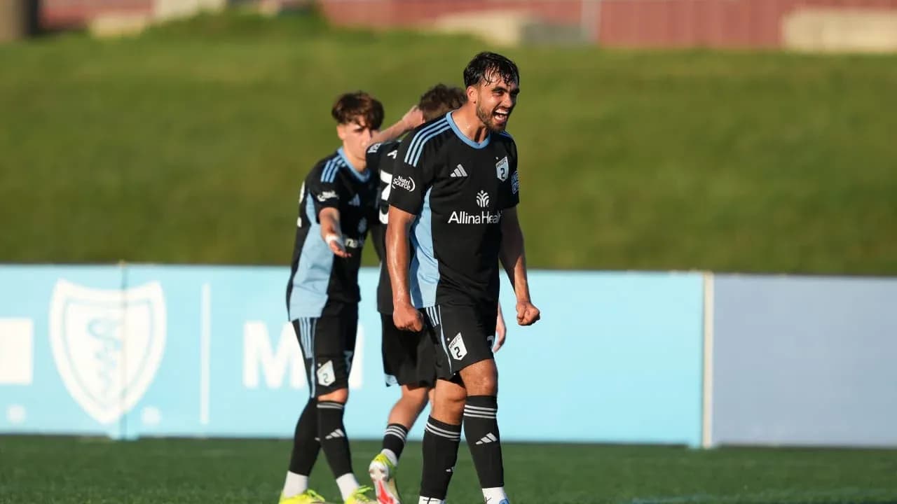 Players celebrating during Sporting KC II match
