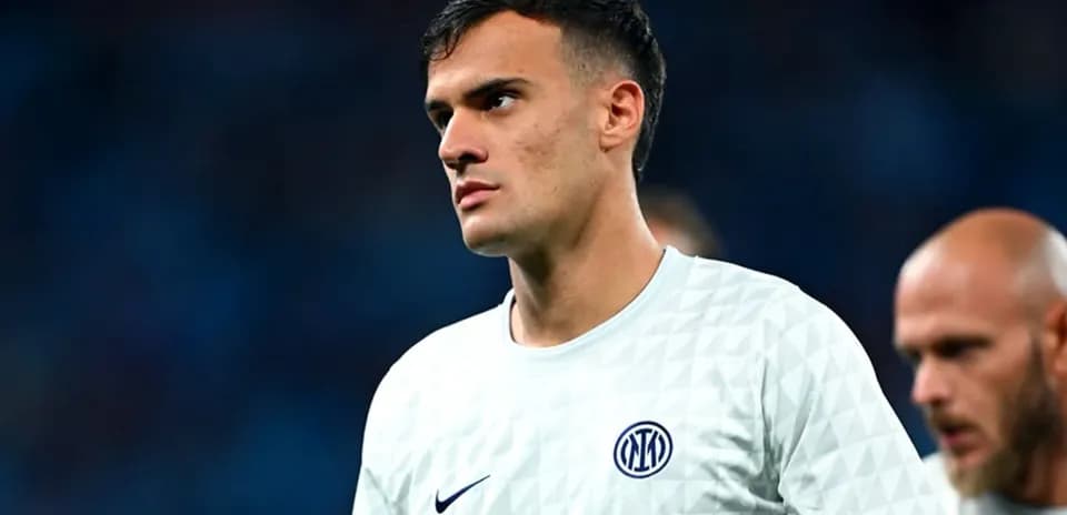 Player in Inter Milan jersey during match warm-up
