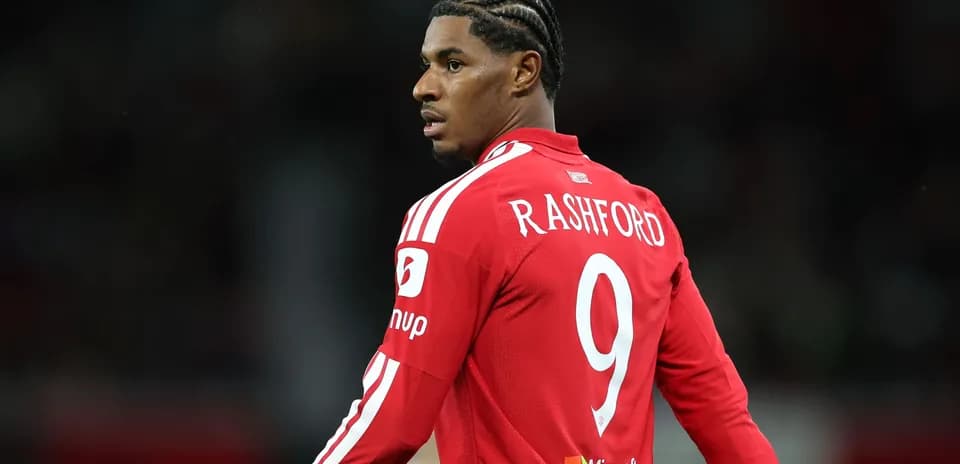 Player in red jersey with number 9 during match