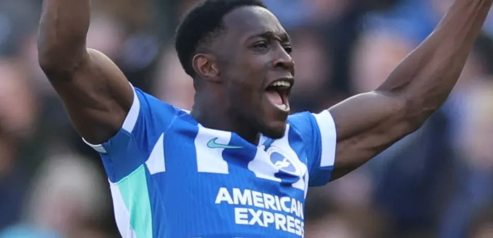 Player celebrating a goal with raised arms