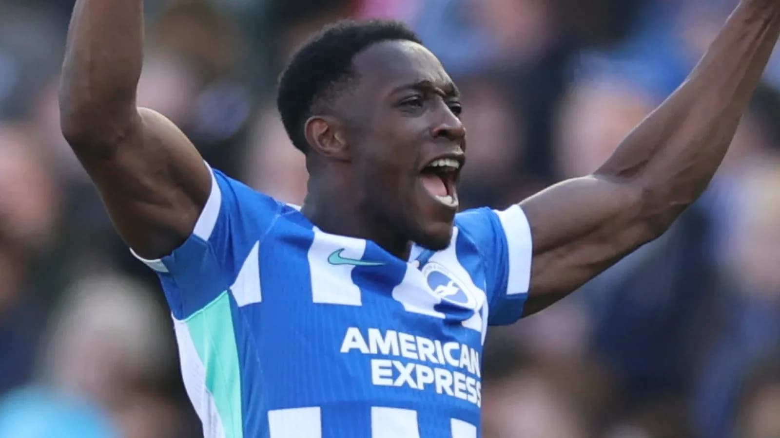 Player celebrating a goal with raised arms