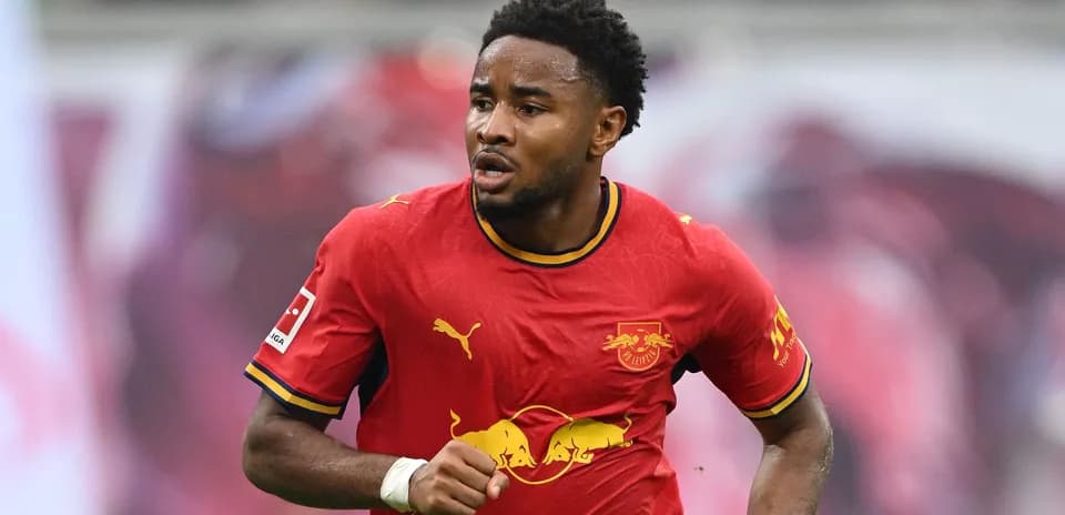 Player running in RB Leipzig red kit during match