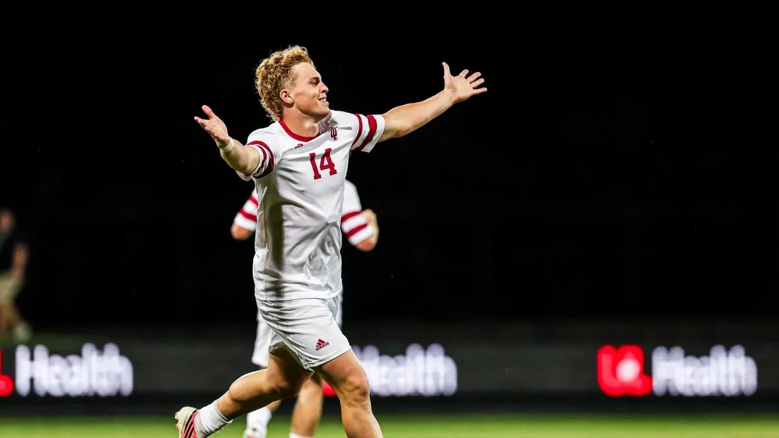 Player celebrating after scoring a goal in soccer
