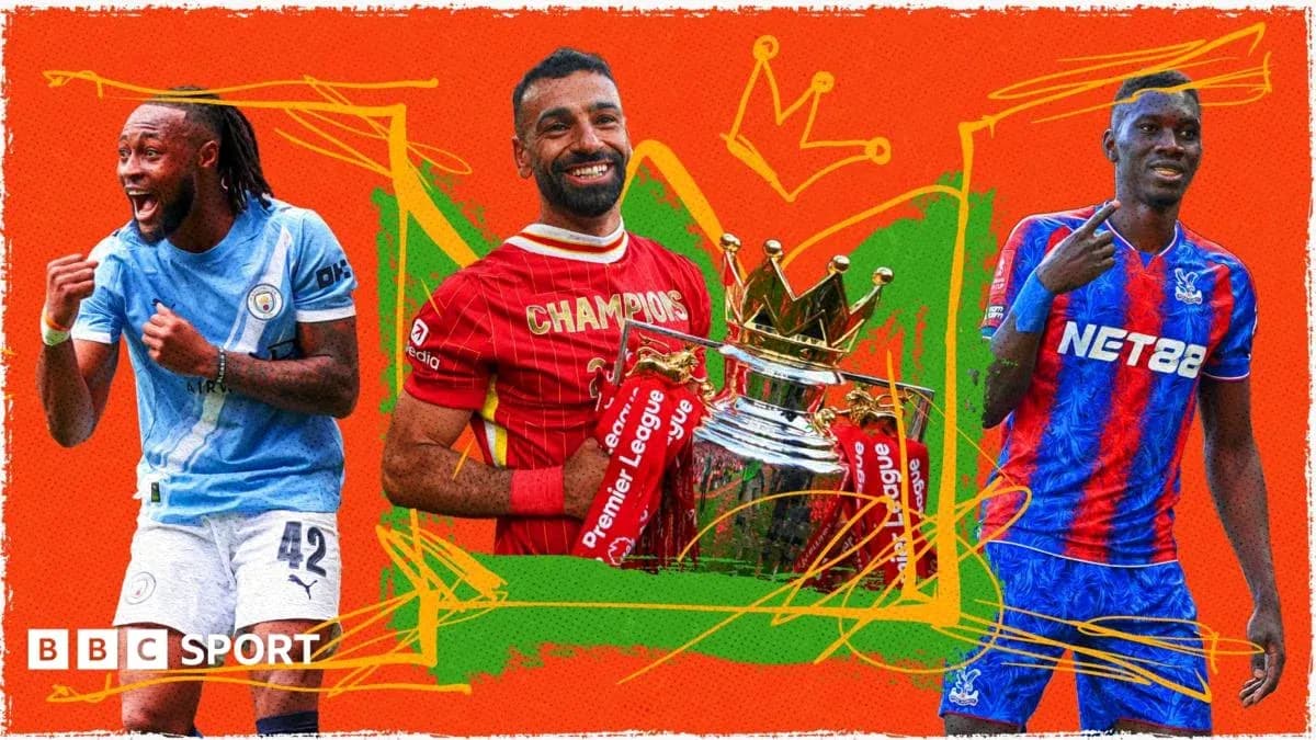 Three football players celebrating with trophies
