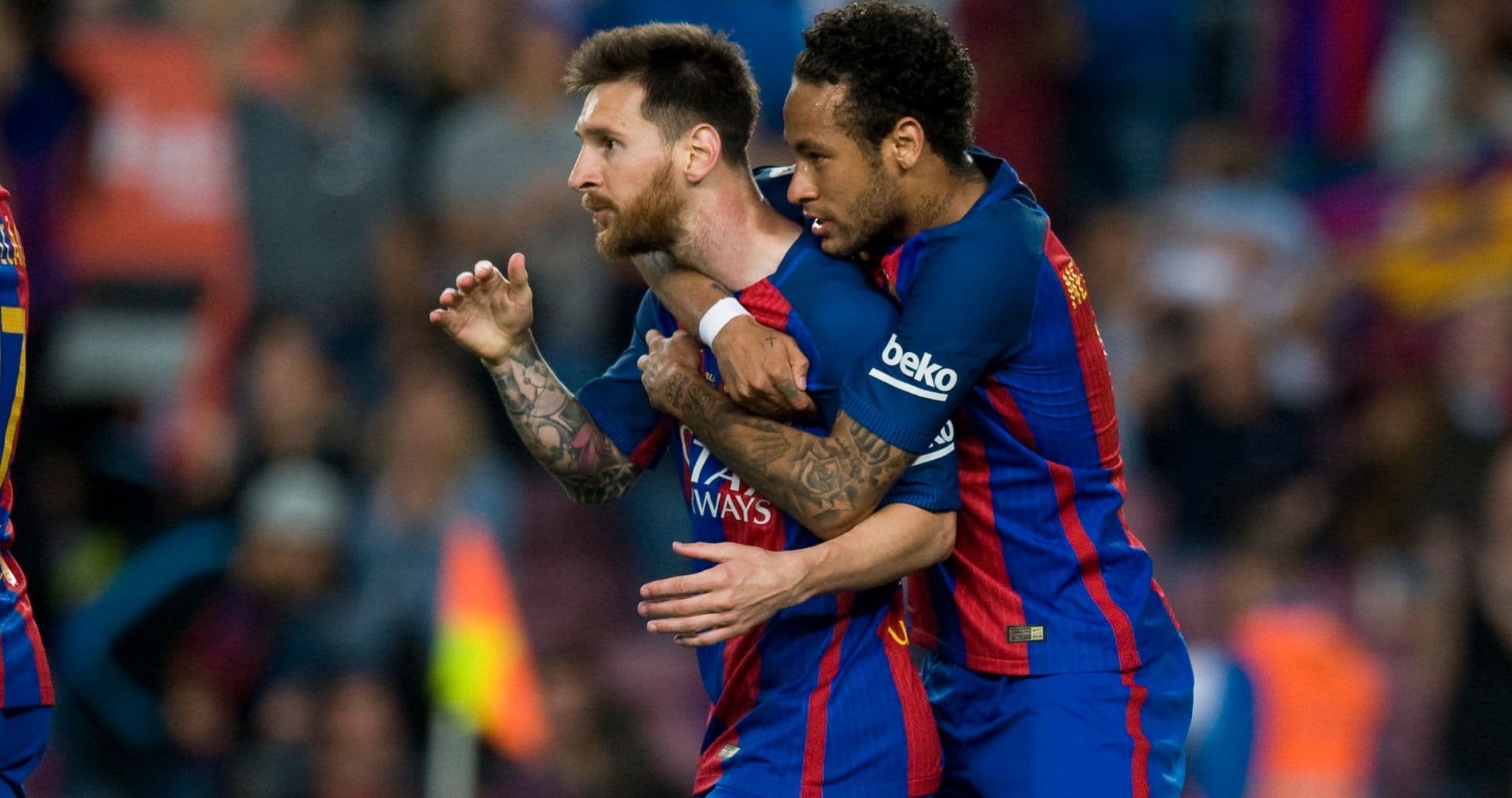 Lionel Messi and Neymar celebrating a goal