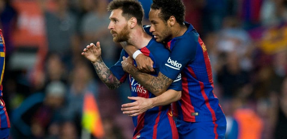 Lionel Messi and Neymar celebrating a goal