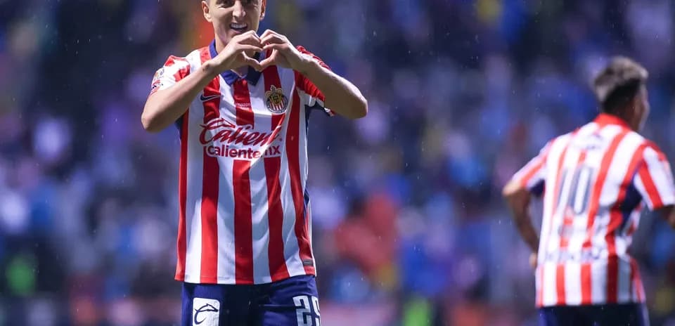 Chivas player celebrating goal during Liga MX match