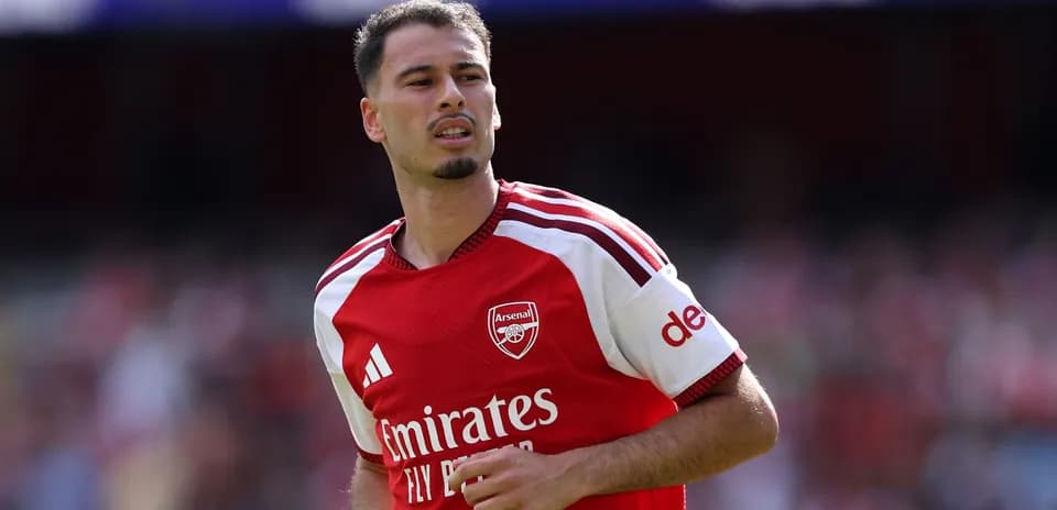 Player wearing Arsenal jersey during match