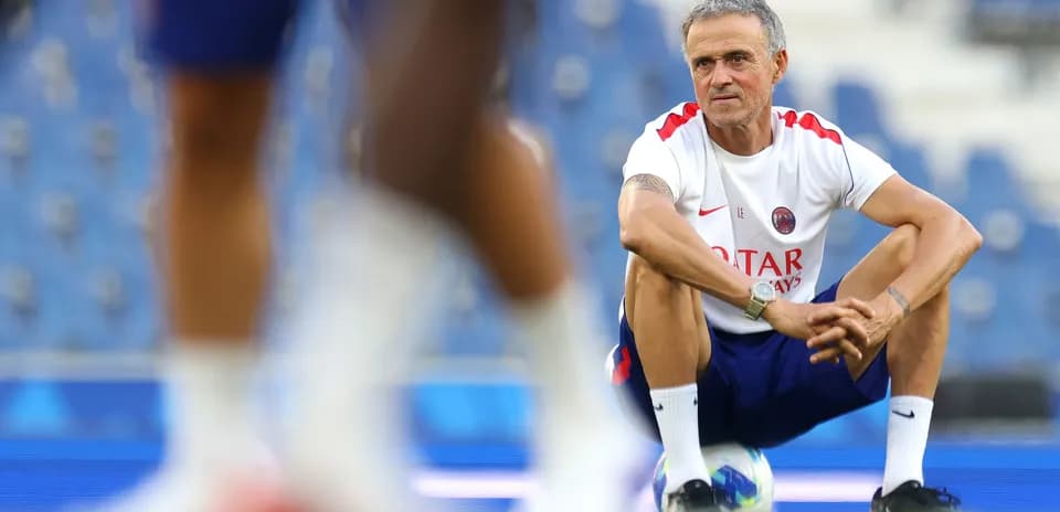 Coach observing training session at stadium