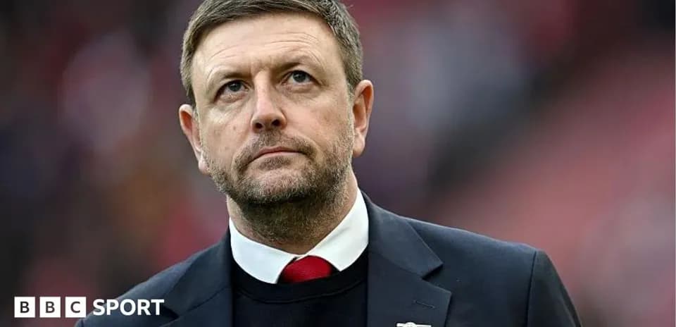 Manager looking up during a match