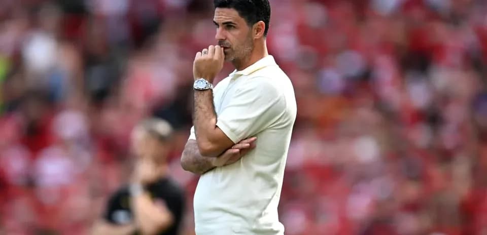 Manager observing match from the sidelines