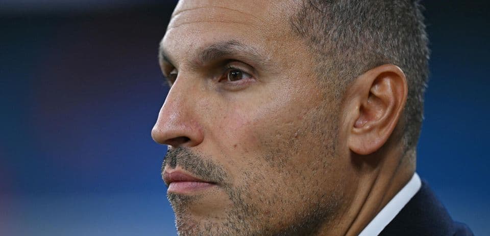 Close-up profile of a man with short hair