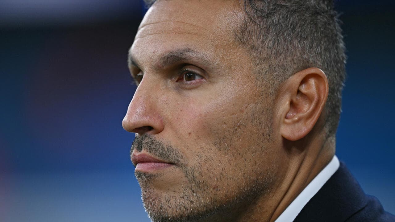 Close-up profile of a man with short hair