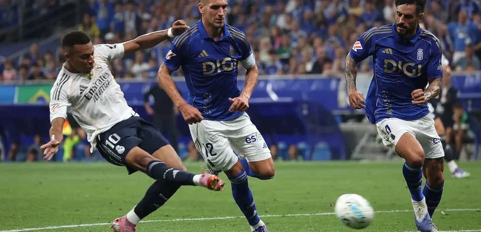 Real Madrid player shooting during match against Oviedo