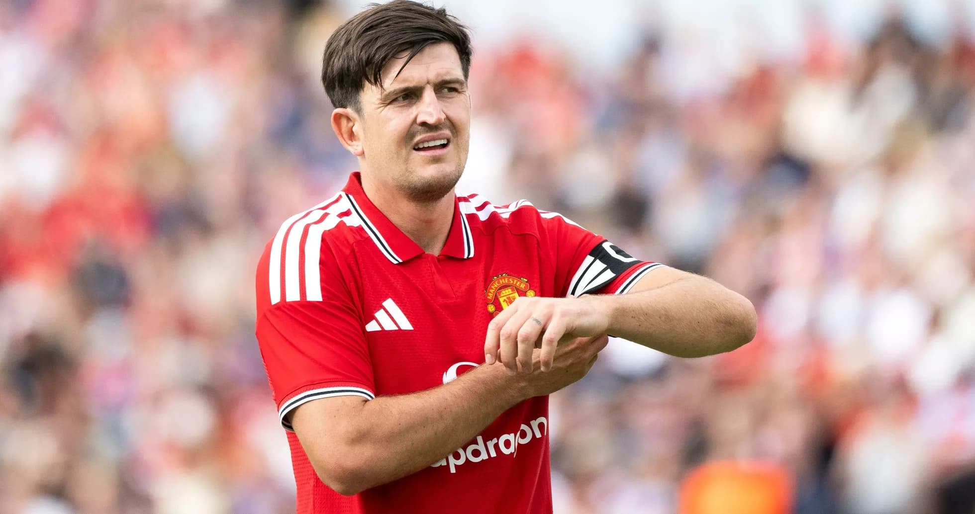 Player adjusting wrist during match action