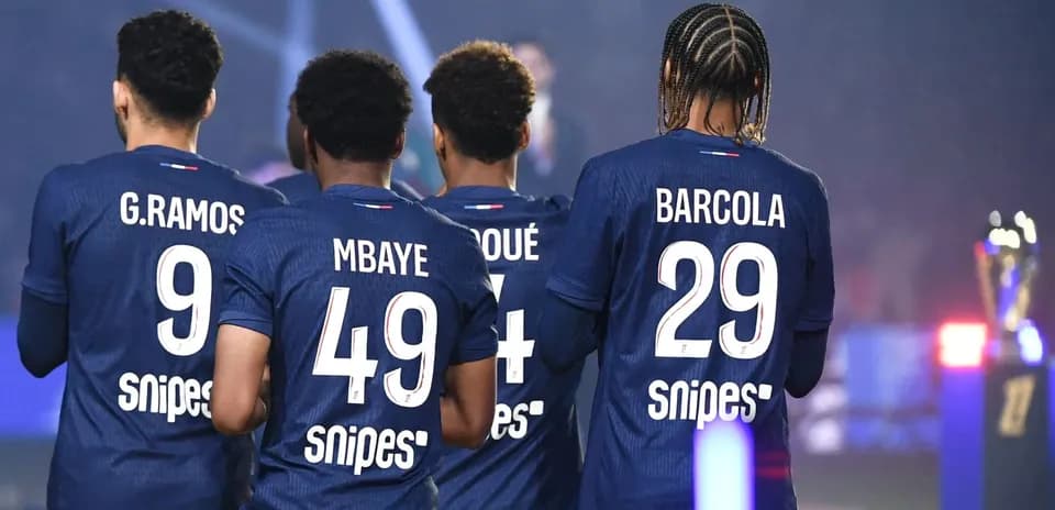 Players wearing jerseys during trophy presentation ceremony