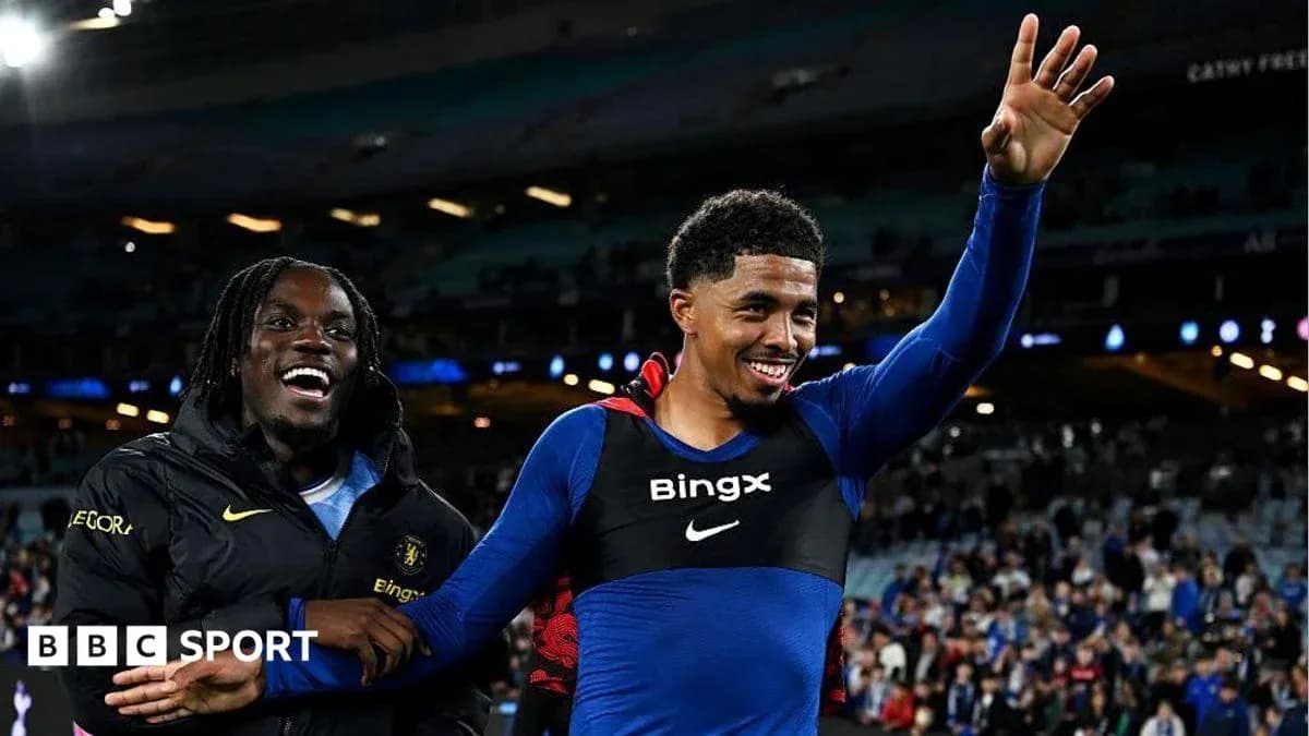 Two players celebrating on the field after match