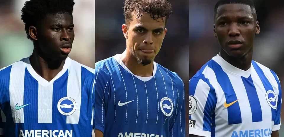 Three Brighton players in blue and white kits