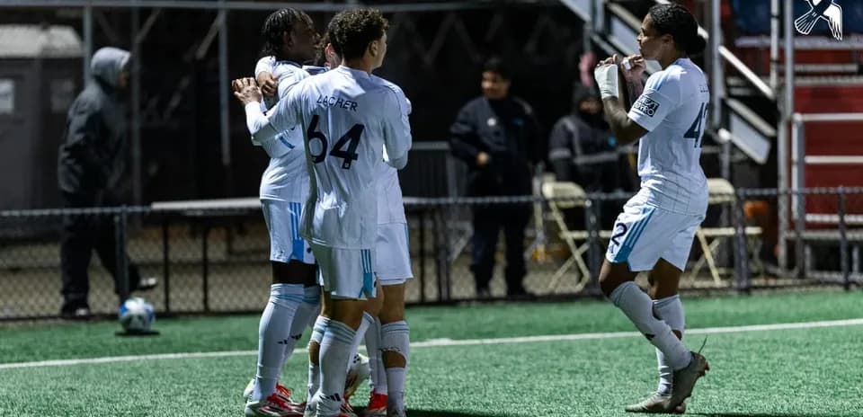 Players celebrating a goal during MLS Next Pro match