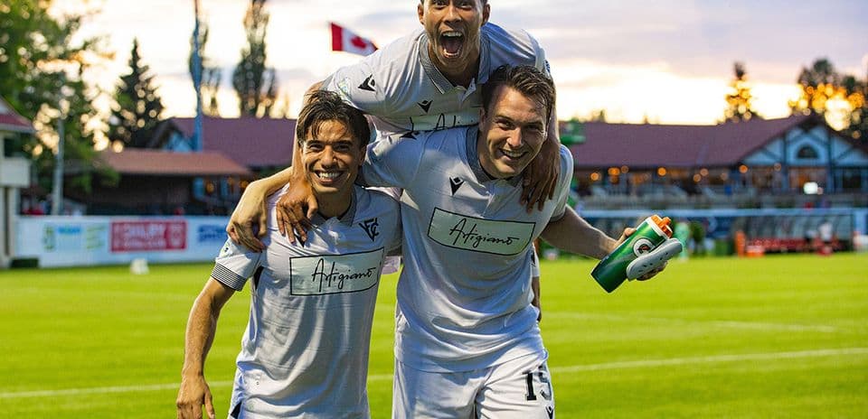 Vancouver FC players celebrating after match