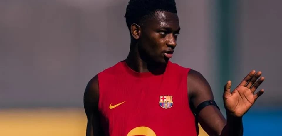 Player in training kit gesturing during practice