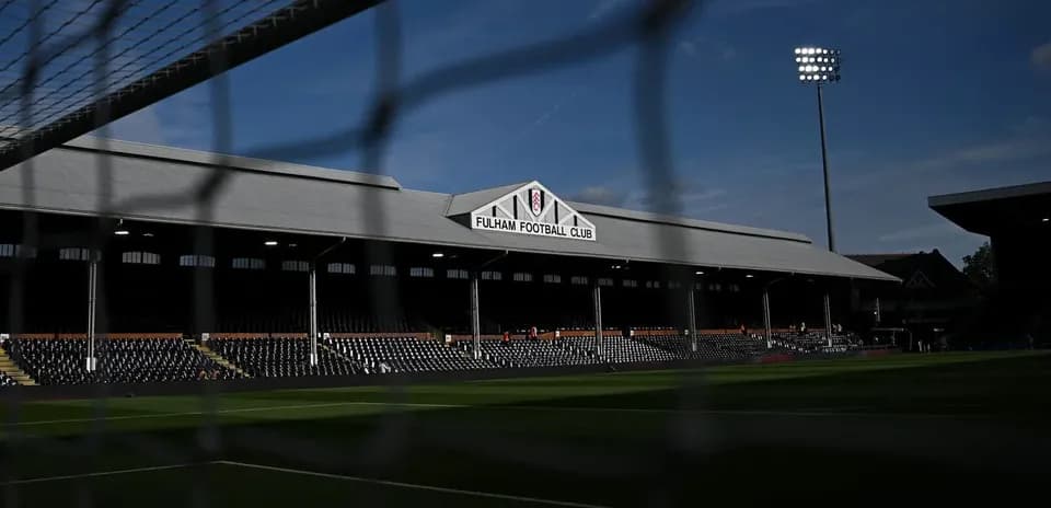 Craven Cottage stadium with Fulham Football Club sign