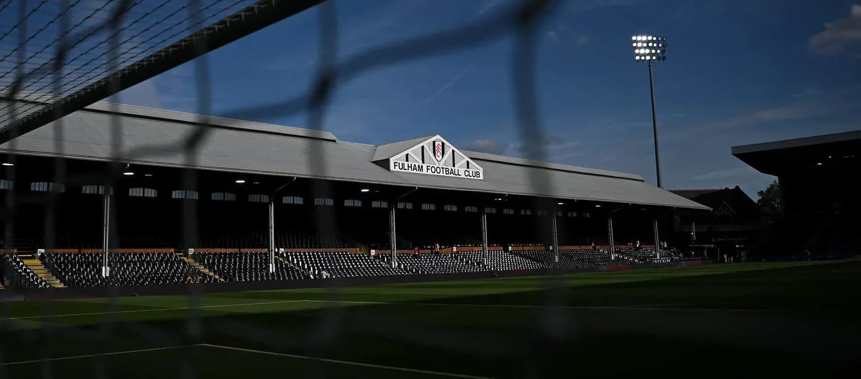 Craven Cottage stadium with Fulham Football Club sign