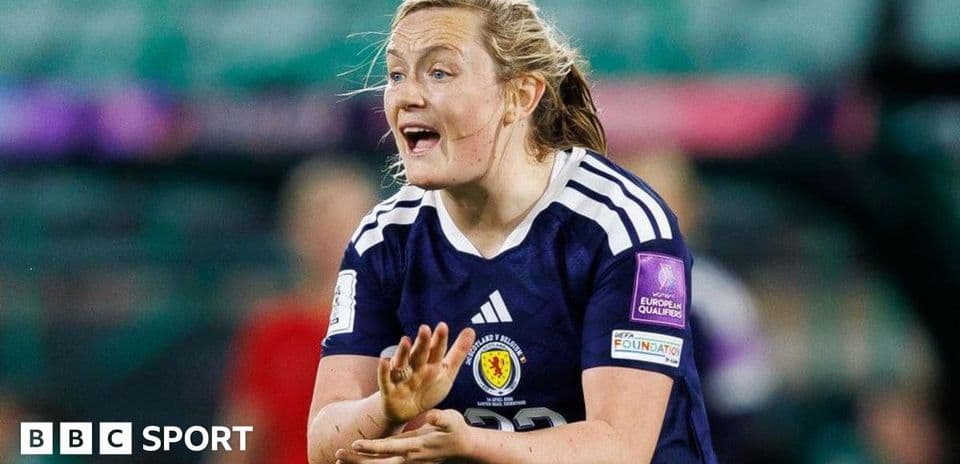 Player gesturing during women's football match