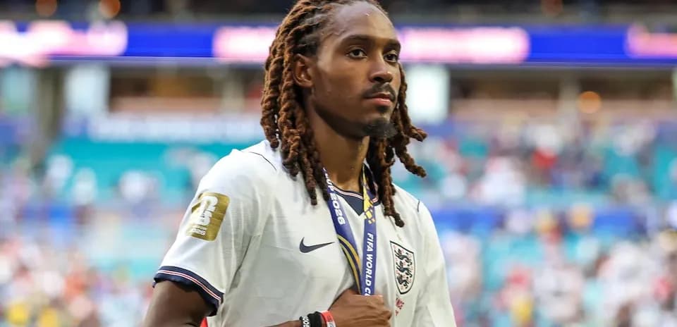 Player walking off the field wearing England jersey