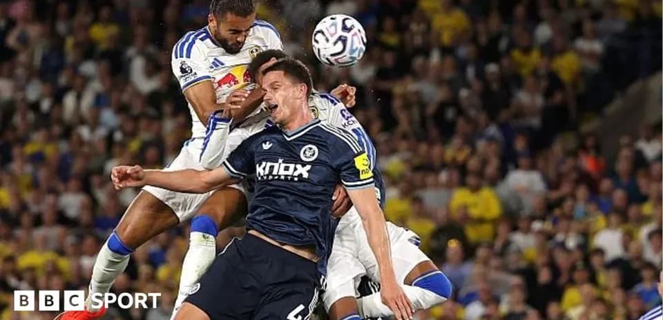 Players contesting for the ball during a match