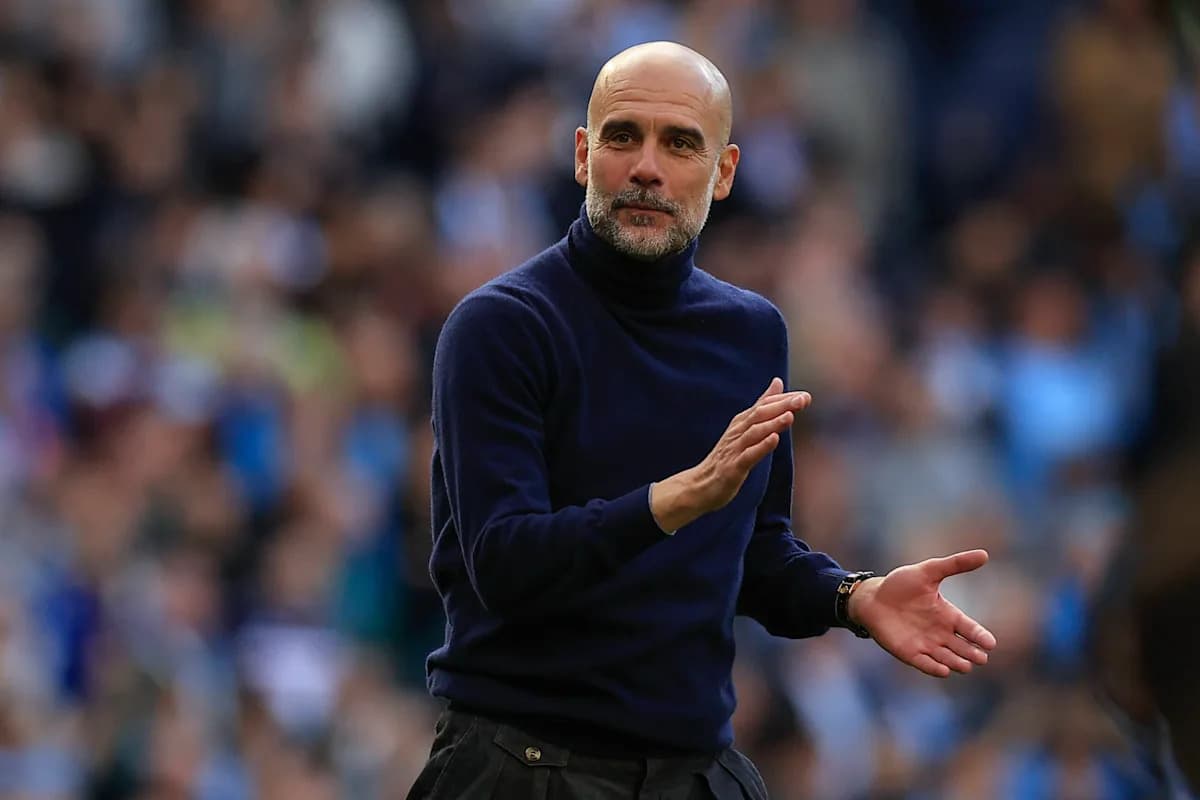Manager gesturing on the sidelines during match