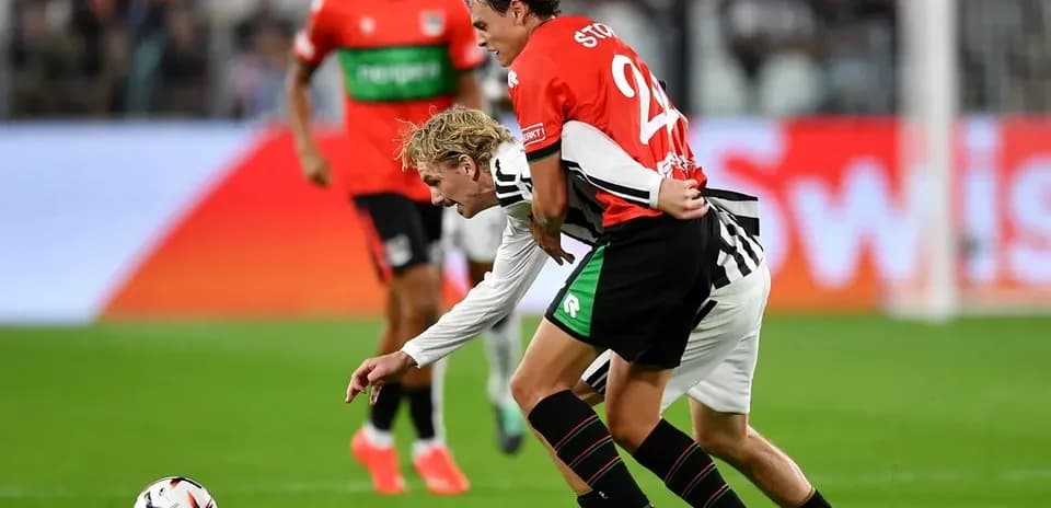 Players competing for the ball during a match