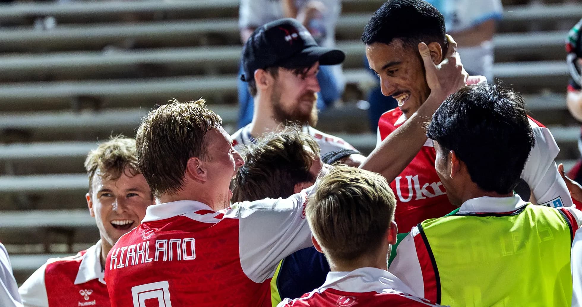 Players celebrating a goal during football match