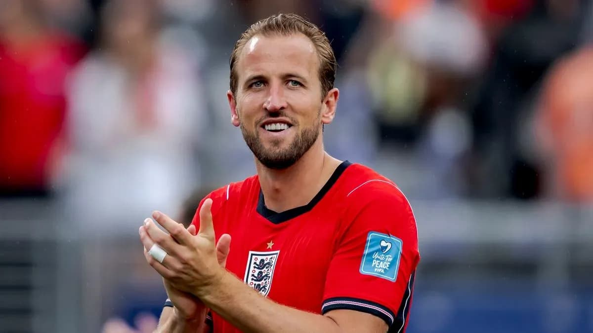 Player in red jersey applauding to the crowd