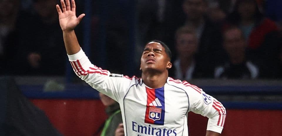 Player celebrating a goal with raised hand
