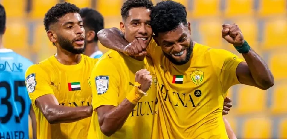 Players celebrating after a goal in U23 match