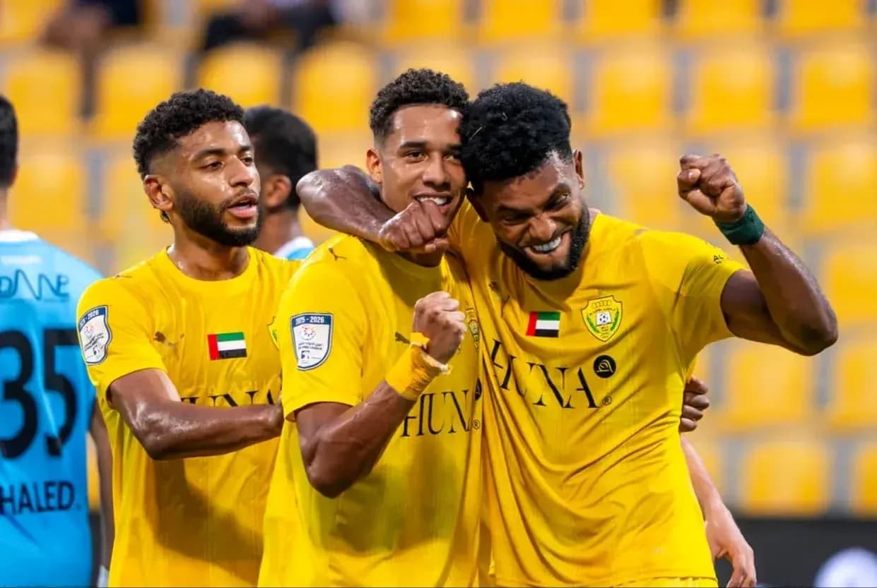Players celebrating after a goal in U23 match