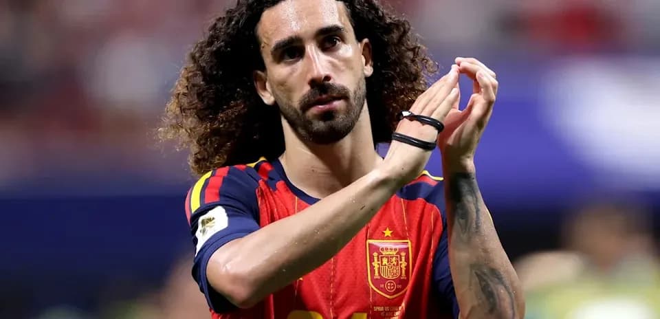 Player applauding fans wearing Spain national team jersey