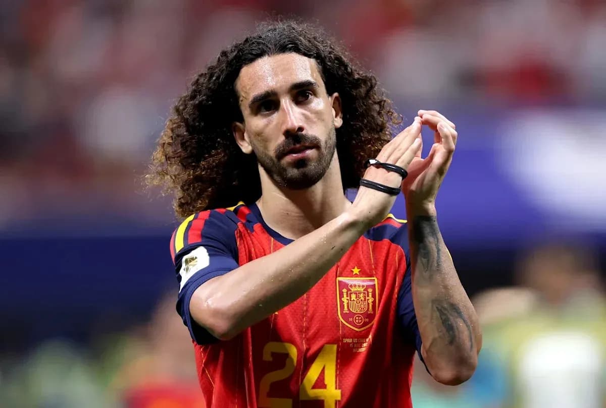 Player applauding fans wearing Spain national team jersey