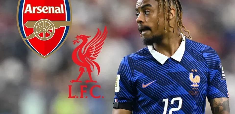 Player wearing France kit with Arsenal and Liverpool logos