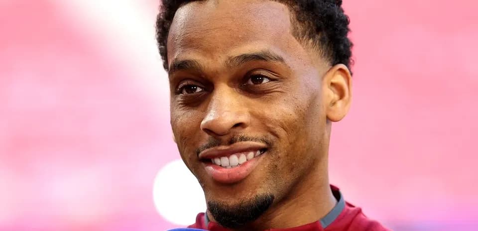Player speaking into microphone during interview