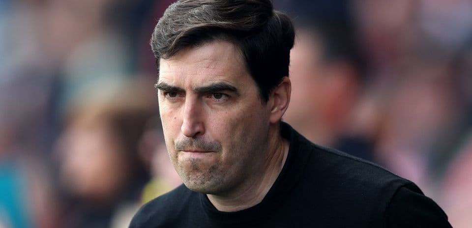Coach looking focused during a match