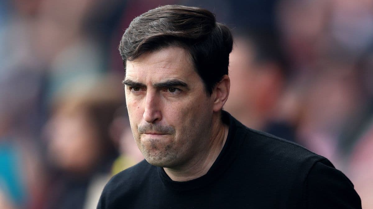 Coach looking focused during a match