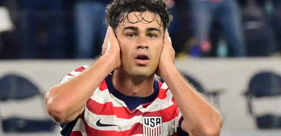 Player with hands on head during match