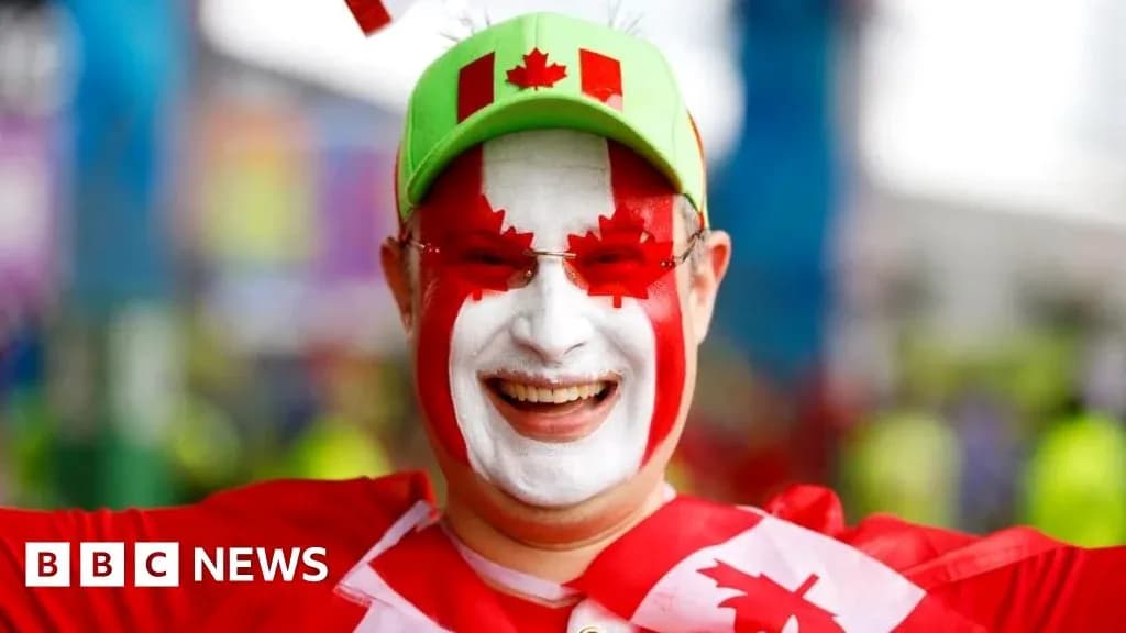 Fan with painted face celebrating at event