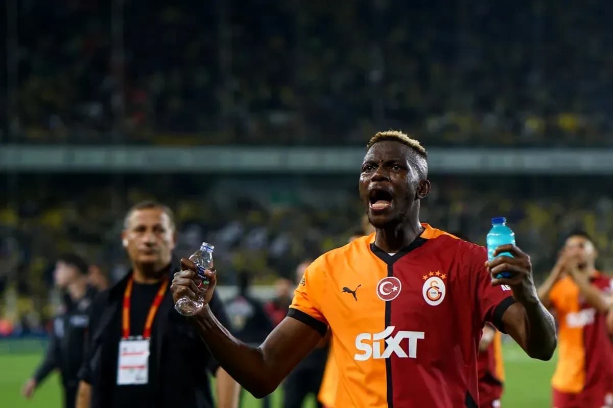 Player celebrating with water bottles after match