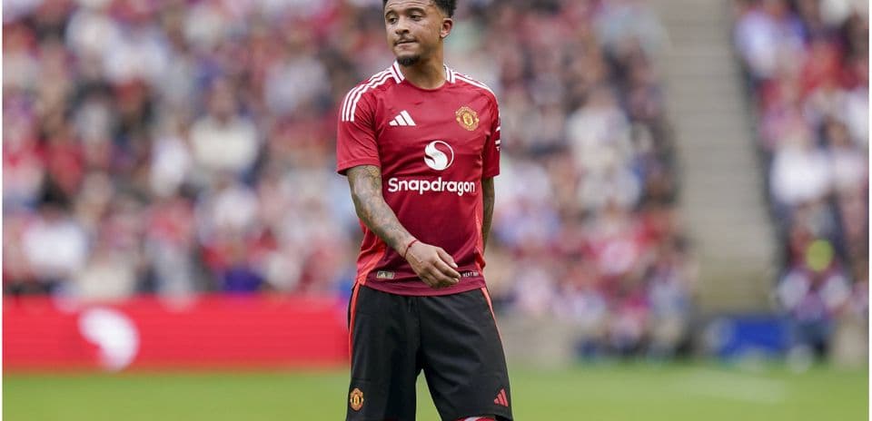 Player wearing Manchester United kit on the pitch